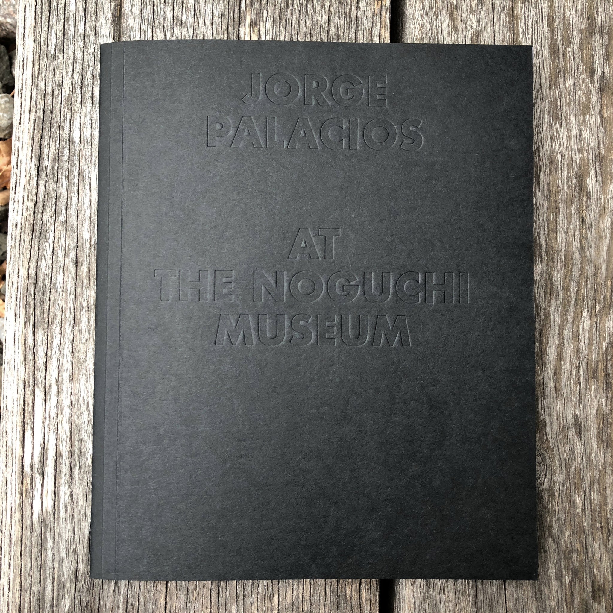 'Jorge Palacios at The Noguchi Museum' cover. Black paper cover with blind-stamped sans serif type.